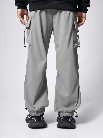 Manfinity EMRG Men Solid Flap Pocket Drawstring Waist Oversized Cargo Baggy Pants