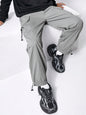 Manfinity EMRG Men Solid Flap Pocket Drawstring Waist Oversized Cargo Baggy Pants