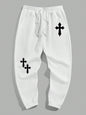 Manfinity EMRG Men'S Street Style Black Asymmetric Cross Print Tapered Sweatpants with White Track Pants.