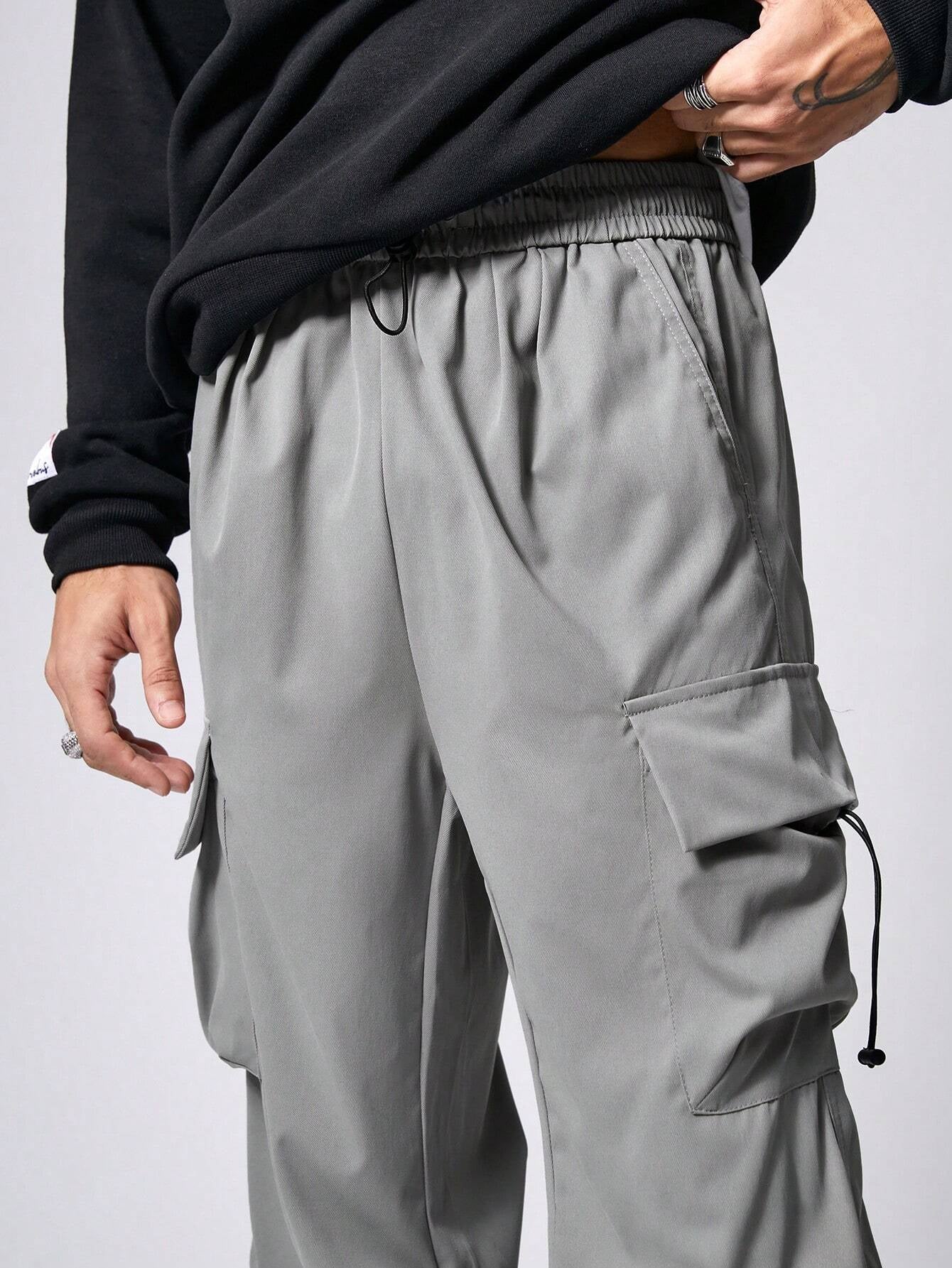 Manfinity EMRG Men Solid Flap Pocket Drawstring Waist Oversized Cargo Baggy Pants